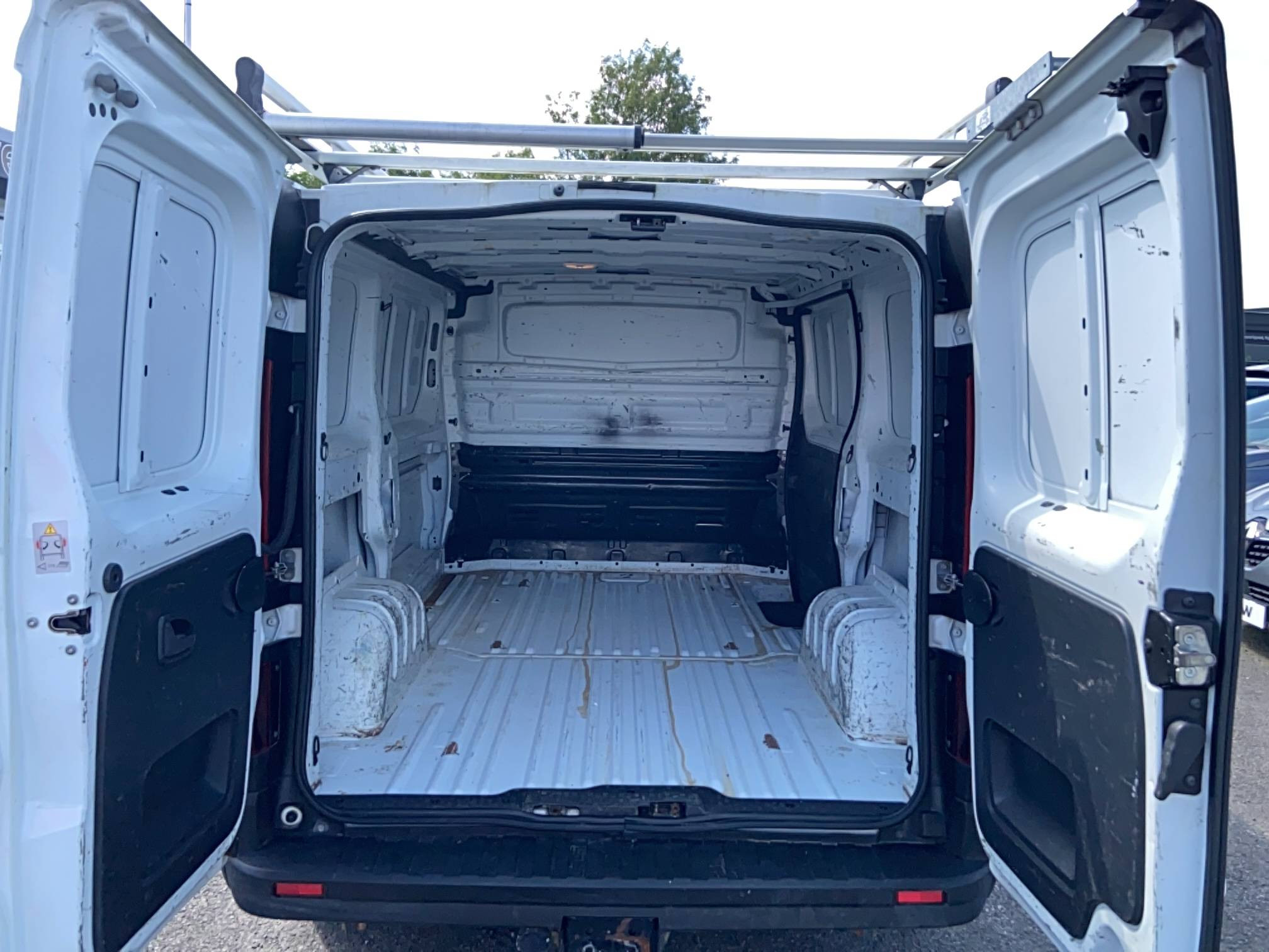 Vente en ligne Renault Trafic 3 Fourgon TRAFIC FGN L1H1 1000 KG DCI 95 E6 au prix de 14 990 €