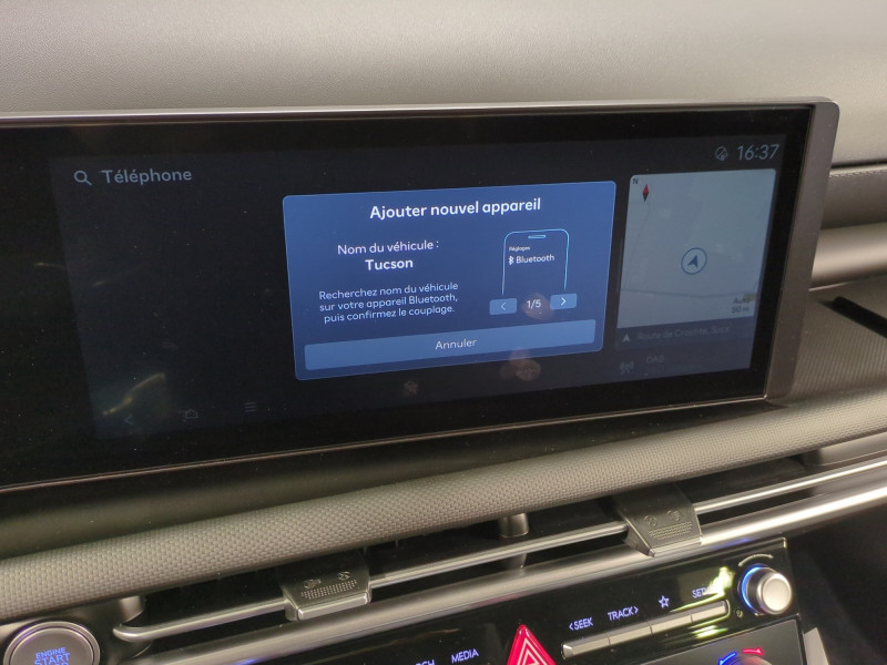 Photo 13 de l'offre de HYUNDAI TUCSON 1.6 T-GDI 215CH HYBRID CREATIVE -22% à 32998€ chez Automobiles 25