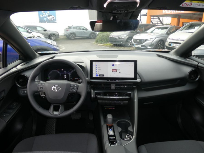 Photo 5 de l'offre de TOYOTA C-HR II 1.8 HYBRIDE 140 CVT 2WD DESIGN GPS 12.3 Camera JA18 Diam. Induction à 30850€ chez Mérignac auto