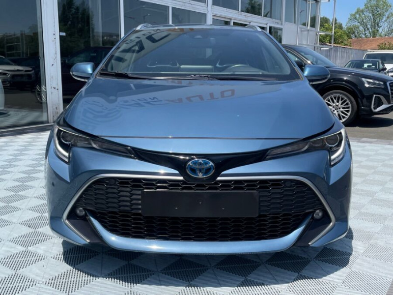 Photo 8 de l'offre de TOYOTA COROLLA XII TOURING SPORTS 1.8 HYBRIDE 122H BVA PREMIUM CUIR 4SC Hayon EL. JA17 à 24590€ chez Mérignac auto