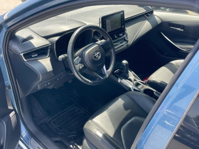 Photo 15 de l'offre de TOYOTA COROLLA XII TOURING SPORTS 1.8 HYBRIDE 122H BVA PREMIUM CUIR 4SC Hayon EL. JA17 à 24590€ chez Mérignac auto