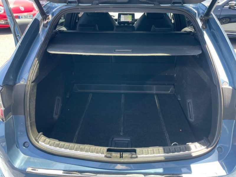 Photo 19 de l'offre de TOYOTA COROLLA XII TOURING SPORTS 1.8 HYBRIDE 122H BVA PREMIUM CUIR 4SC Hayon EL. JA17 à 24590€ chez Mérignac auto