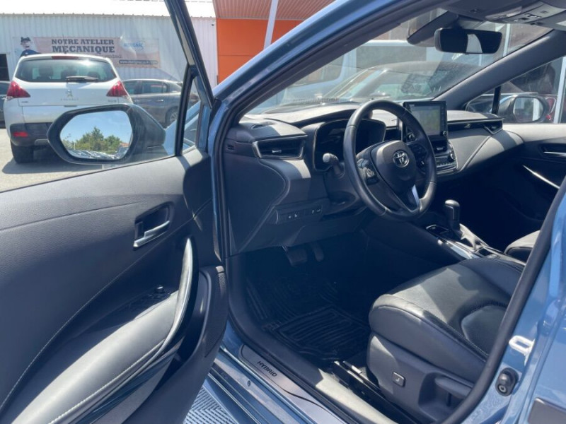 Photo 14 de l'offre de TOYOTA COROLLA XII TOURING SPORTS 1.8 HYBRIDE 122H BVA PREMIUM CUIR 4SC Hayon EL. JA17 à 24590€ chez Mérignac auto