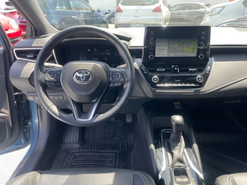 Photo 4 de l'offre de TOYOTA COROLLA XII TOURING SPORTS 1.8 HYBRIDE 122H BVA PREMIUM CUIR 4SC Hayon EL. JA17 à 24590€ chez Mérignac auto
