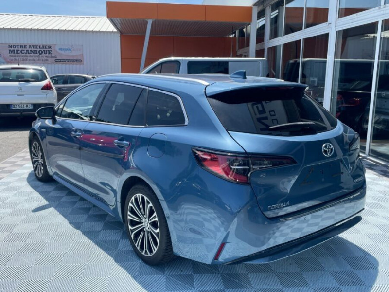 Photo 10 de l'offre de TOYOTA COROLLA XII TOURING SPORTS 1.8 HYBRIDE 122H BVA PREMIUM CUIR 4SC Hayon EL. JA17 à 24590€ chez Mérignac auto