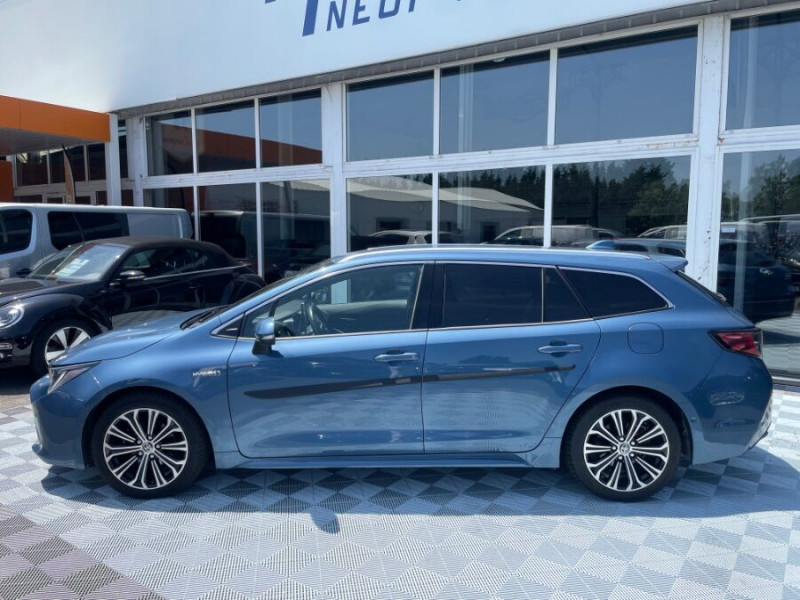 Photo 12 de l'offre de TOYOTA COROLLA XII TOURING SPORTS 1.8 HYBRIDE 122H BVA PREMIUM CUIR 4SC Hayon EL. JA17 à 24590€ chez Mérignac auto