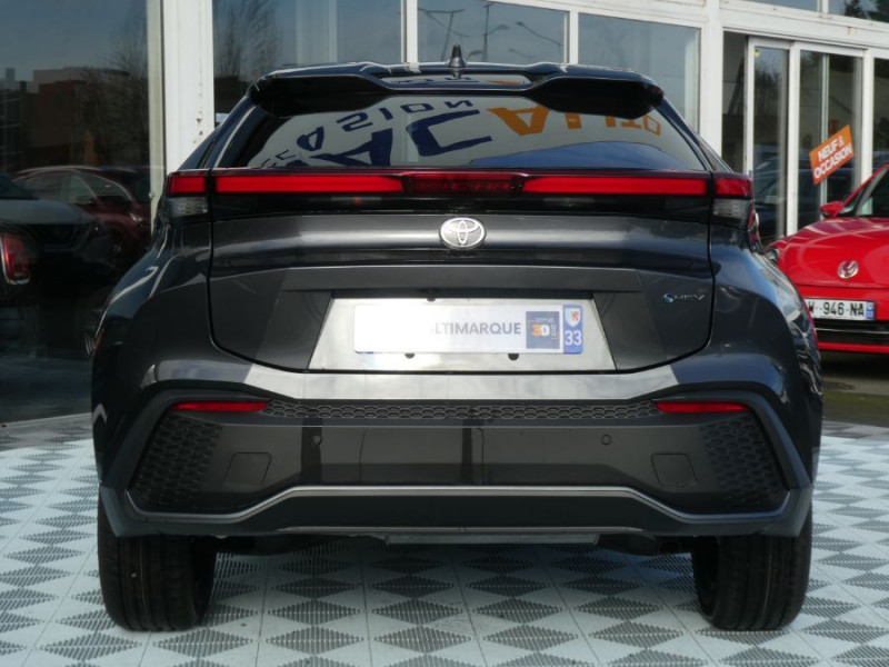Photo 10 de l'offre de TOYOTA C-HR II 1.8 HYBRIDE 140 CVT 2WD DESIGN GPS 12.3 Camera JA18 Diam. Induction à 30850€ chez Mérignac auto