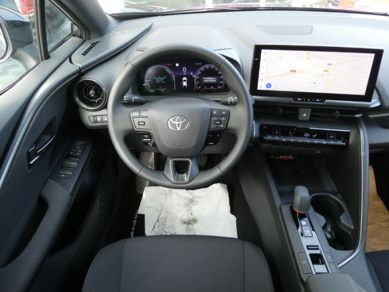 Photo 4 de l'offre de TOYOTA C-HR II 1.8 HYBRIDE 140 CVT 2WD DESIGN GPS 12.3 Camera JA18 Diam. Induction à 30850€ chez Mérignac auto
