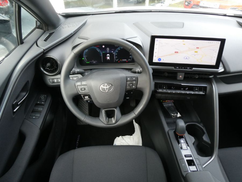 Photo 4 de l'offre de TOYOTA C-HR II 1.8 HYBRIDE 140 CVT 2WD DESIGN GPS 12.3 Camera JA18 Diam. Induction à 29950€ chez Mérignac auto