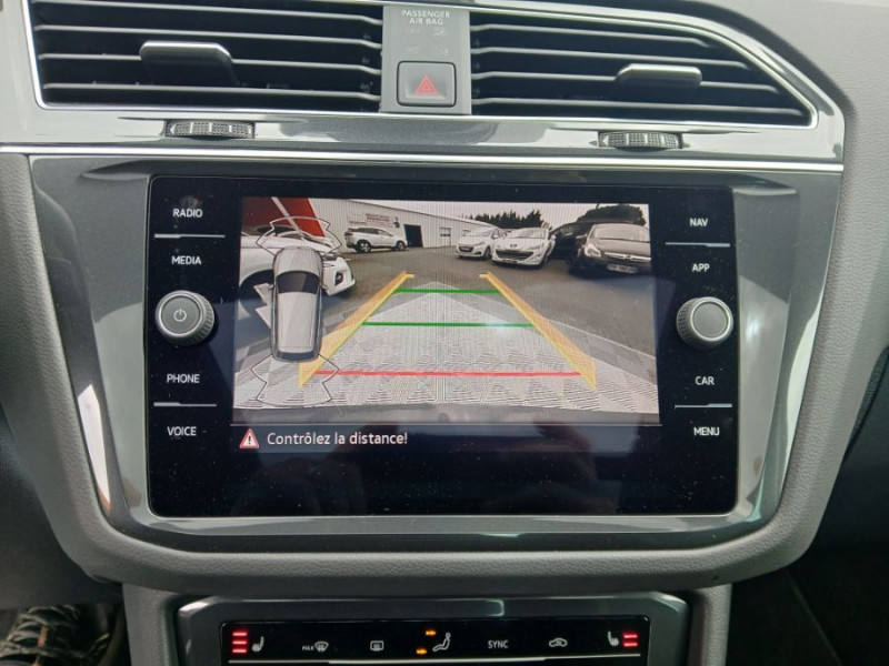 Photo 7 de l'offre de VOLKSWAGEN TIGUAN II (2) 2.0 TDI 150 DSG 2WD ELEGANCE TOE GPS Camera ACC Hayon EL. JA18 1ère Main à 33950€ chez Mérignac auto