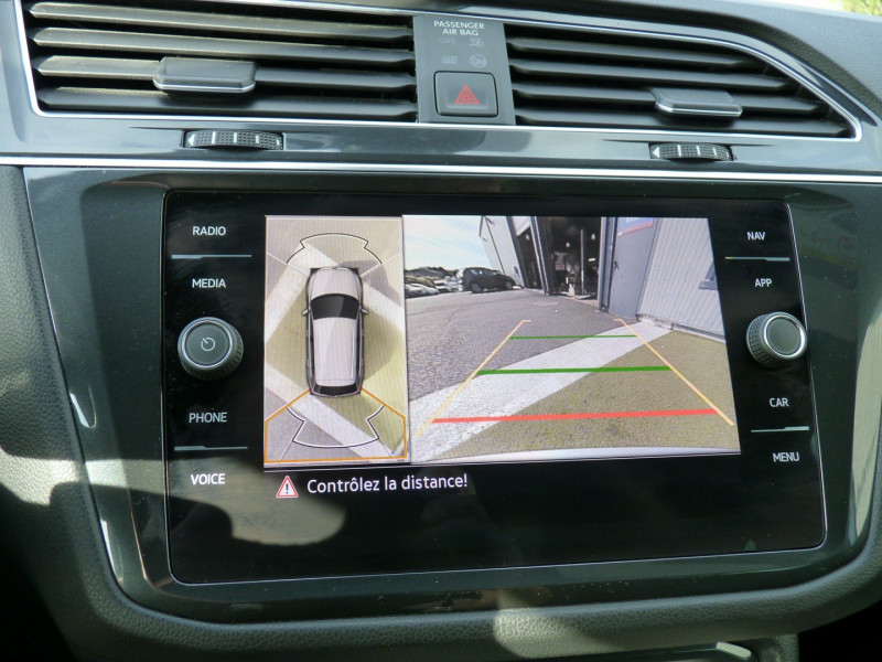 Photo 13 de l'offre de VOLKSWAGEN TIGUAN 1.5 TSI 150CH R-LINE EXCLUSIVE DSG7 à 39490€ chez Vent d'ouest automobiles