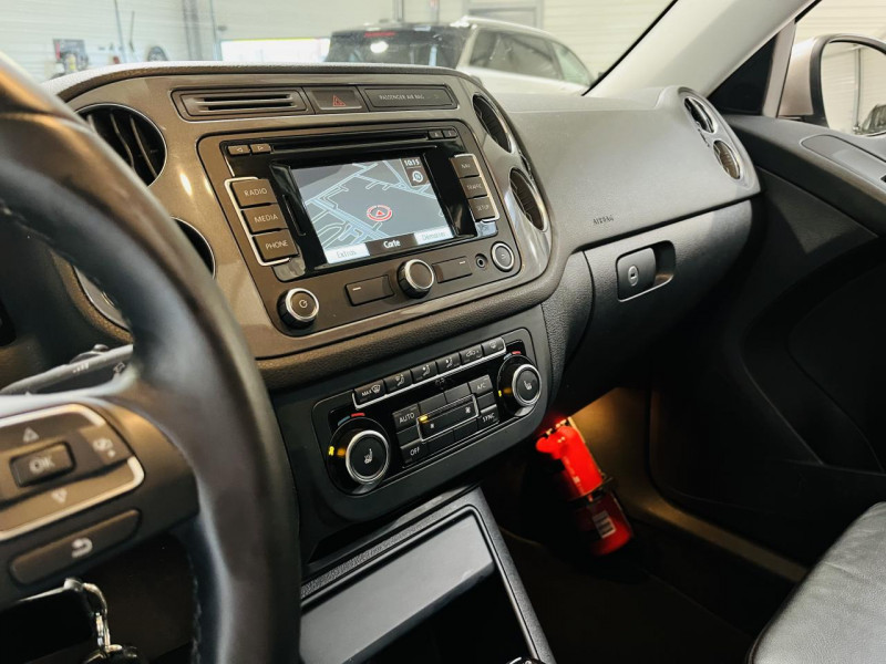 Photo 6 de l'offre de VOLKSWAGEN TIGUAN 1.4 TSI 160 BlueMotion Technology Sportline DSG6 à 17990€ chez Occasions Champenoises